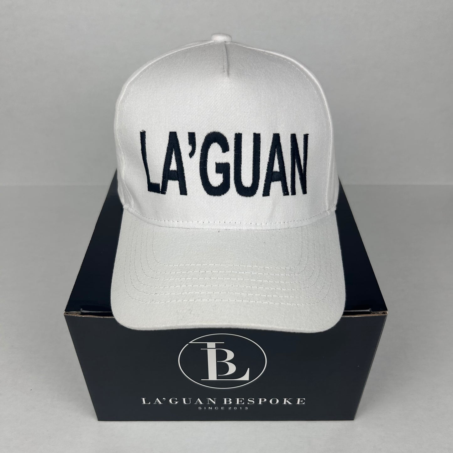 LA'GUAN BLACK LOGO HAT - WHITE